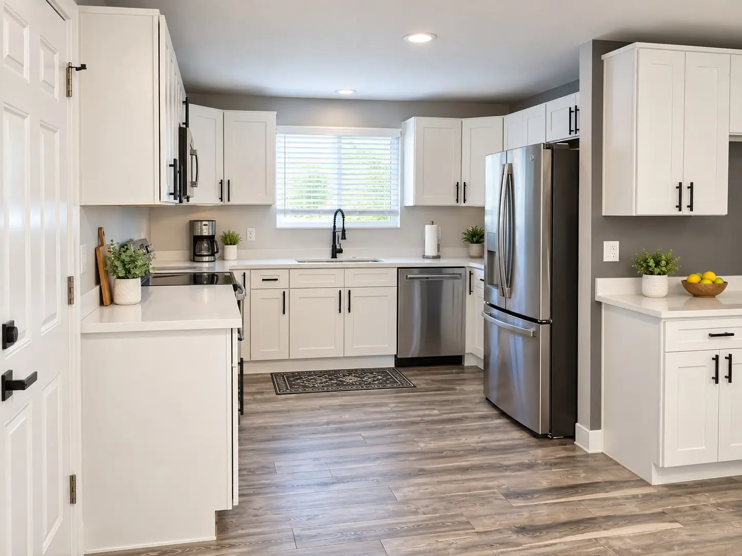 Kitchen with white cabinets and stainless-steel appliances
